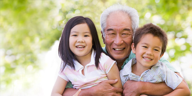 <a href="https://mybenefits.hawaii.gov/welcome-to-mybenefits/">Welcome to My Benefits<br /><span>Read More<span class="fa3icon icon-signin"></span></span></a> photo of a grandfather holding his niece and newphew